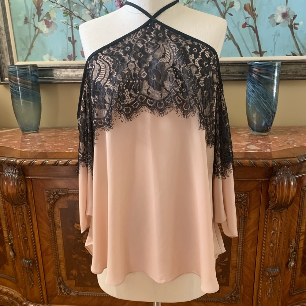 Black lace over nude fabric top